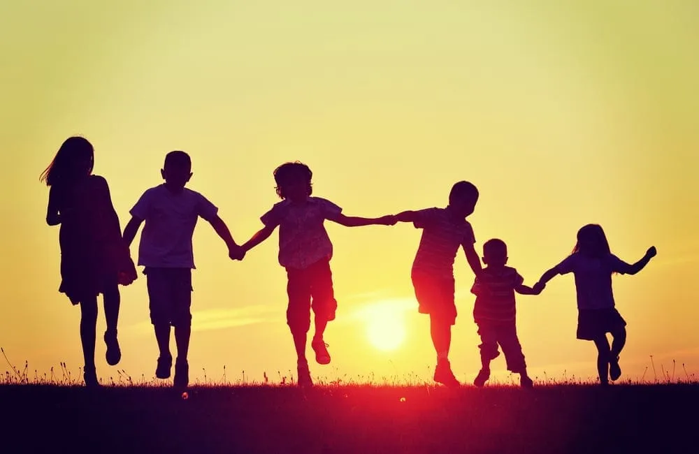 happy-children-silhouettes-on-summer-meadow-running-and-jumping-1-jpeg-1.jpg